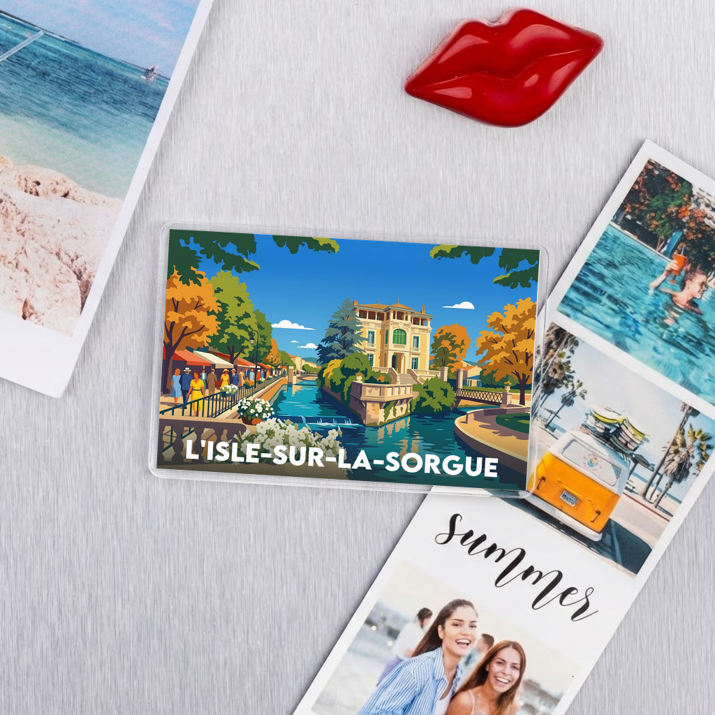 Magnet souvenir de la ville de L'Isle-sur-la-Sorgue avec une illustration stylisée.