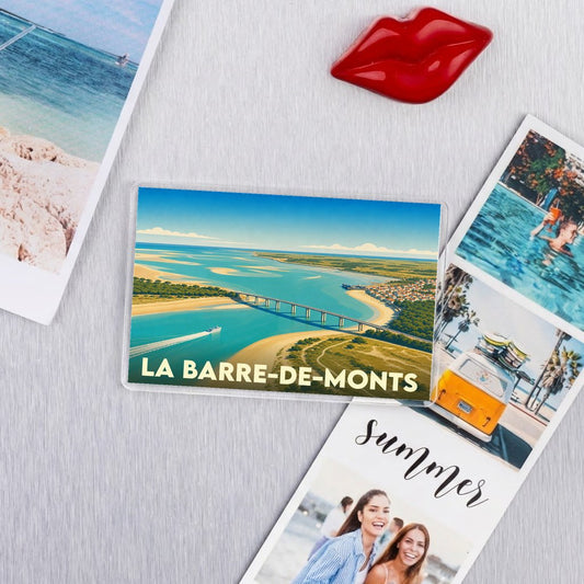 Magnet souvenir de la ville de La Barre-de-Monts avec une illustration stylisée du pont et de la côte.