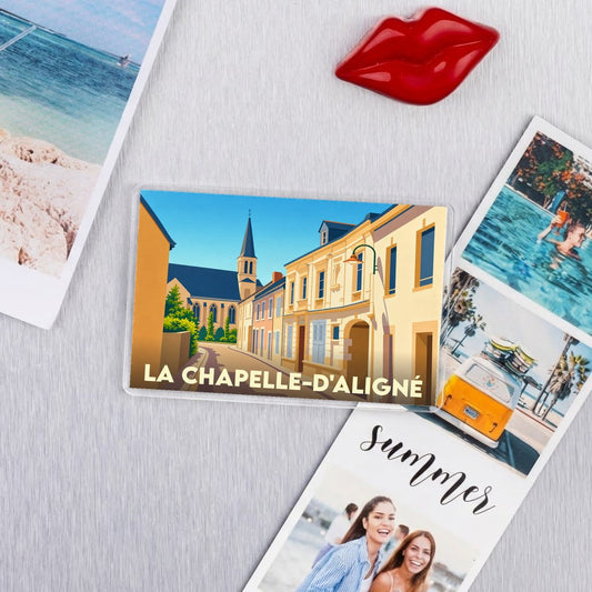 Magnet souvenir de la ville de La Chapelle-d'Aligné avec une illustration stylisée.