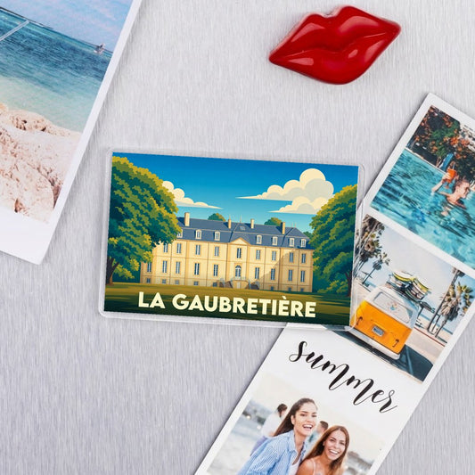 Magnet souvenir de la ville de La Gaubretière avec une illustration stylisée de château.