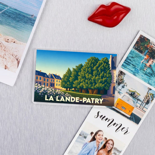 Magnat souvenir de la ville de La Lande-Patry avec une illustration stylisée.