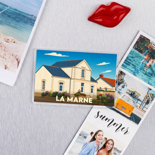 Magnet souvenir de la ville de La Marne avec une illustration stylisée.