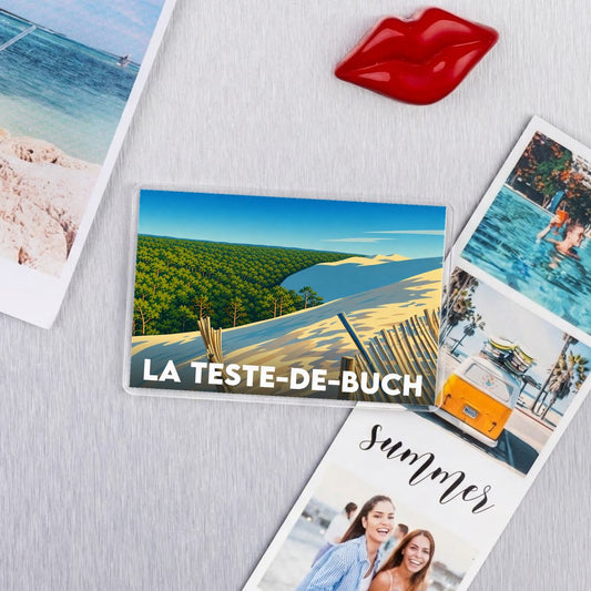 Magnet souvenir de la ville de La Teste-de-Buch avec une illustration stylisée de la dune du Pilat.