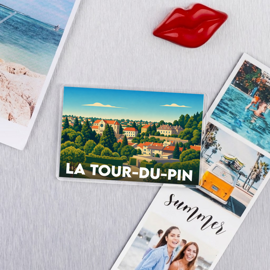 Magnet souvenir de la ville de La Tour-du-Pin avec une illustration stylisée et colorée.
