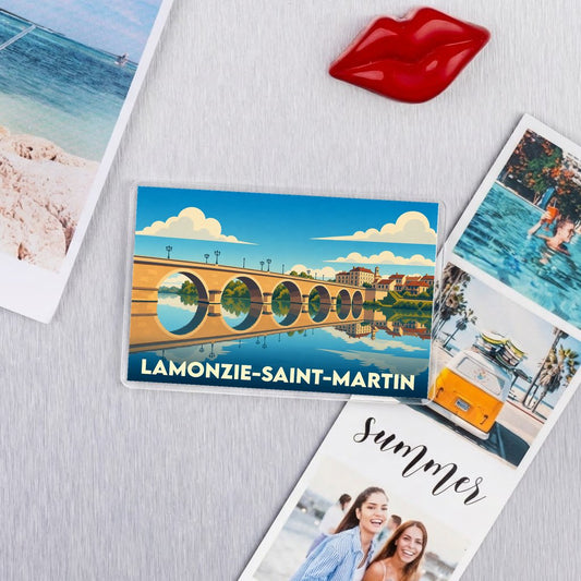 Magnet souvenir de la ville de Lamonzie-Saint-Martin avec une illustration stylisée d'un pont à arches.