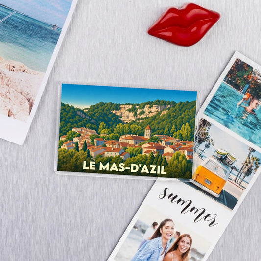 Magnet souvenir de la ville de Le Mas-d'Azil avec une illustration stylisée.