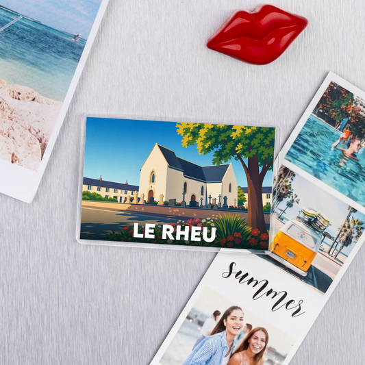 Magnet souvenir de la ville de Le Rheu avec une illustration stylisée.