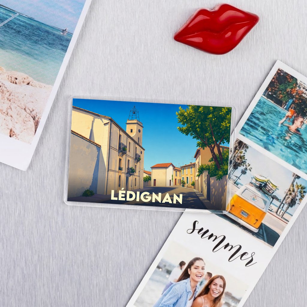 Magnet souvenir de la ville de Lédignan avec une illustration stylisée.