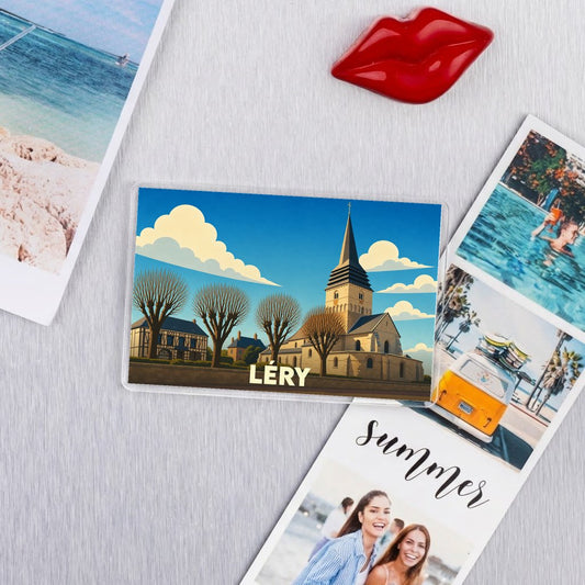 Magnet souvenir de la ville de Léry avec une illustration stylisée de son église et de maisons à colombages.