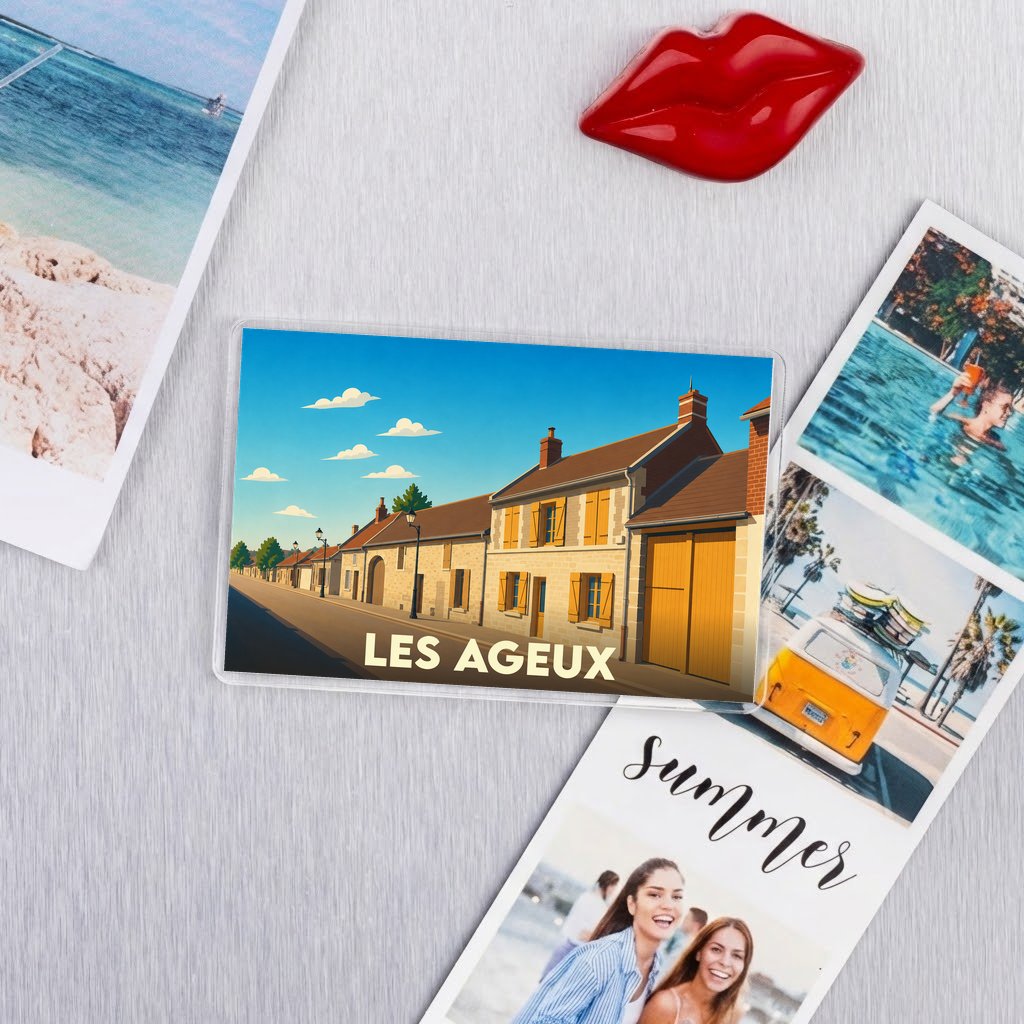 Magnet souvenir de la ville de Les Ageux avec une illustration stylisée d'une rue pittoresque.