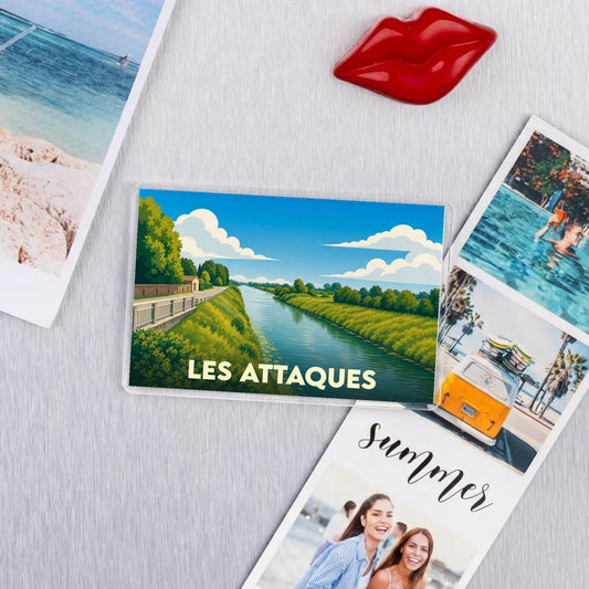 Magnat souvenir de la ville de Les Attaques avec une illustration stylisée d'un canal.