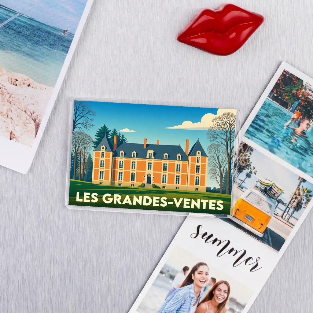 Magnet souvenir de la ville de Les Grandes-Ventes avec une illustration stylisée d'un château.