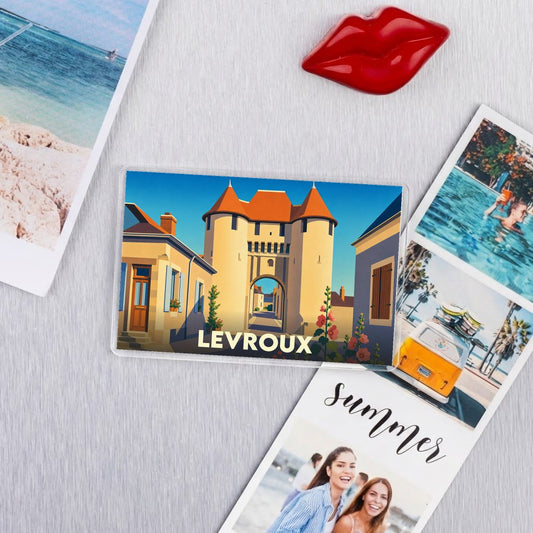Magnet souvenir de la ville de Levroux avec une illustration stylisée de sa porte médiévale.