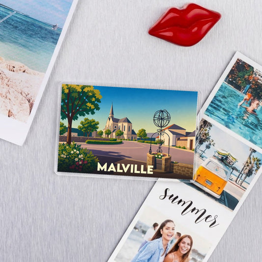 Magnet rectangulaire souvenir de la ville de Malville avec une illustration stylisée d'un paysage urbain.