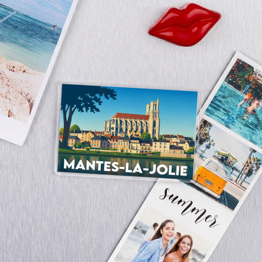 Magnet souvenir de la ville de Mantes-la-Jolie avec une illustration stylisée.