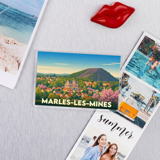 Magnet souvenir de la ville de Marles-les-Mines avec une illustration panoramique stylisée.