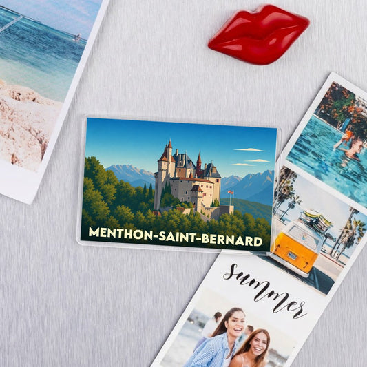 Magnet souvenir de la ville de Menthon-Saint-Bernard avec une illustration stylisée du château.