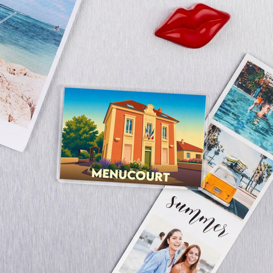 Magnet souvenir de la ville de Menucourt avec une illustration stylisée de l'hôtel de ville.