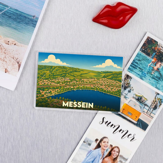 Magnet souvenir de la ville de Messein avec une illustration stylisée de son paysage.