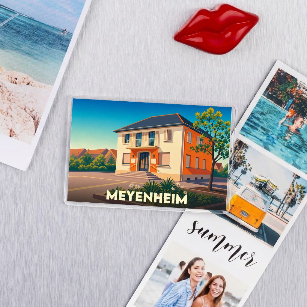 Magnet souvenir de la ville de Meyenheim avec une illustration stylisée.