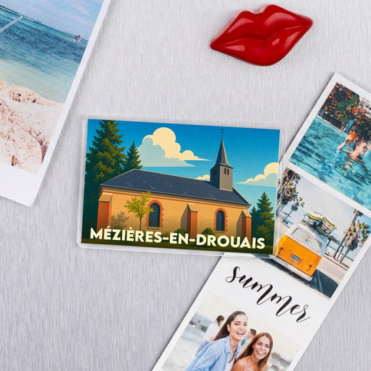 Magnet souvenir de la ville de Mézières-en-Drouais avec une illustration stylisée de son église.