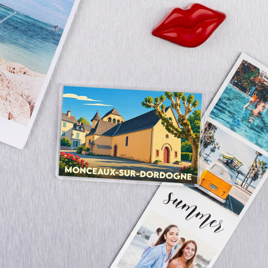 Magnet souvenir de Monceaux-sur-Dordogne avec une illustration colorée de l'église du village.