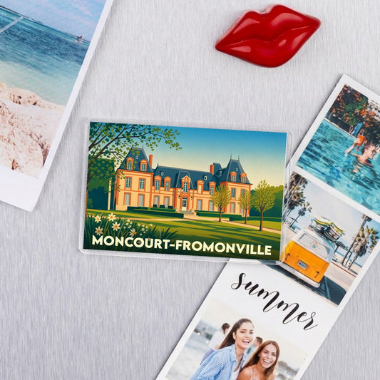 Magnet souvenir de la ville de Moncourt-Fromonville avec une illustration stylisée de son château.