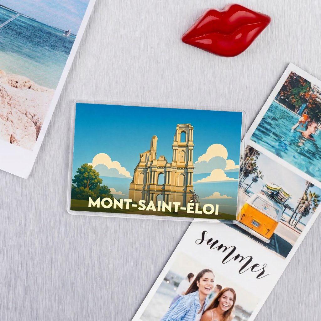 Magnet souvenir de la ville de Mont-Saint-Éloi avec une illustration stylisée de son abbaye.