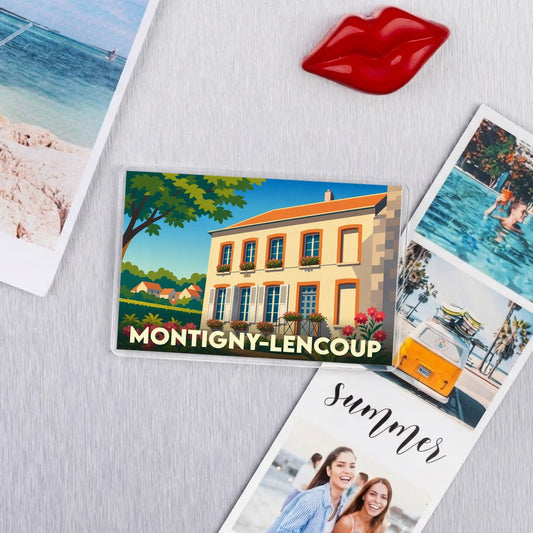 Magnet souvenir de la ville de Montigny-Lencoup avec une illustration stylisée d'une maison fleurie.