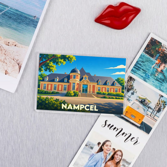 Magnet souvenir de la ville de Nampcel avec une illustration stylisée de son architecture.