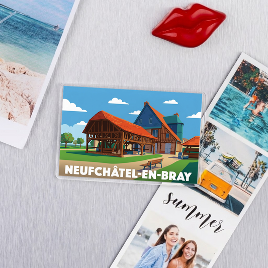 Magnet souvenir de la ville de Neufchâtel-en-Bray avec une illustration stylisée.