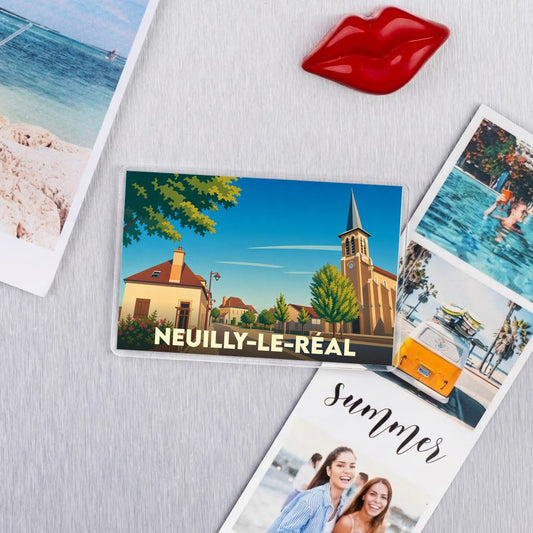 Magnet souvenir de la ville de Neuilly-le-Réal avec une illustration stylisée.