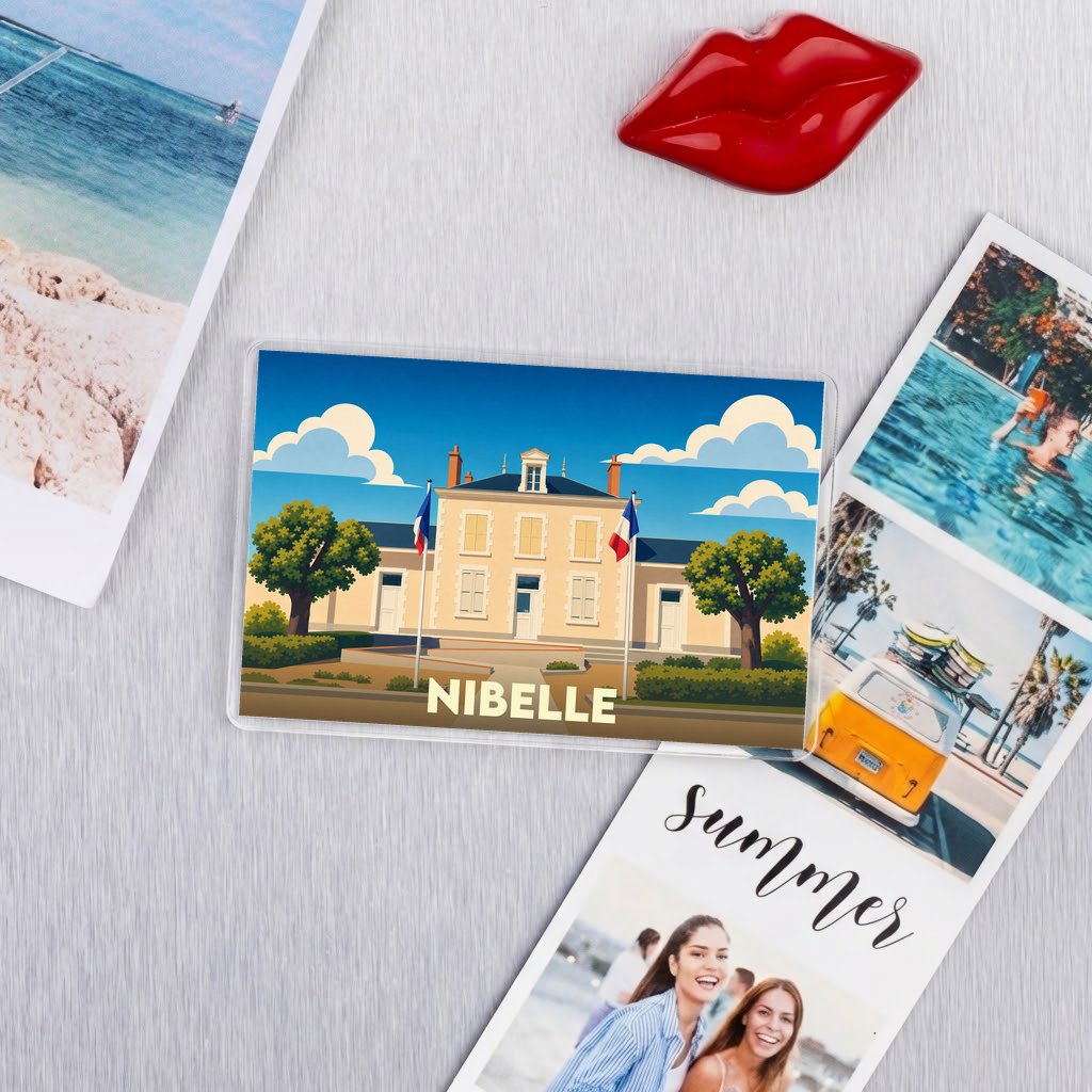 Magnet souvenir de la ville de Nibelle avec une illustration stylisée de sa mairie.