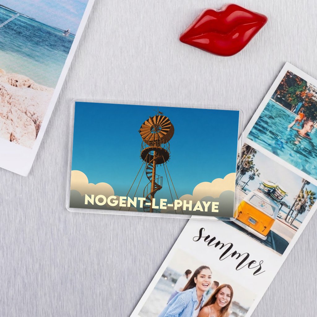 Magnet souvenir de la ville de Nogent-le-Phaye avec une illustration stylisée d'un château d'eau éolien.