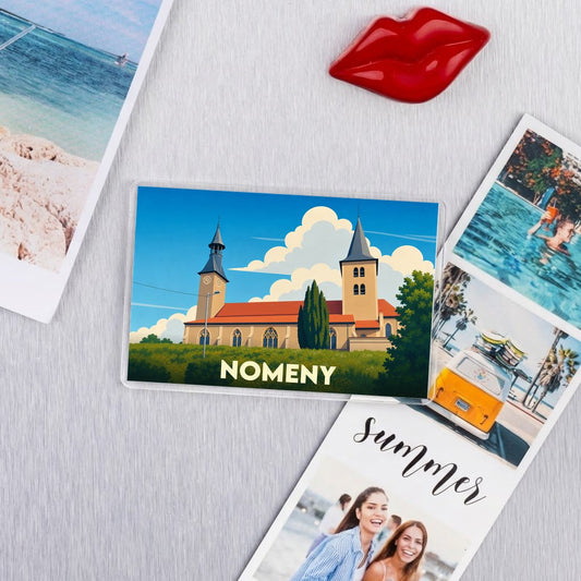 Magnet souvenir de la ville de Nomeny avec une illustration stylisée de son église.