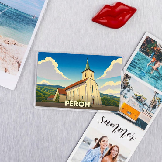 Magnet souvenir de la ville de Péron avec une illustration stylisée de son église.