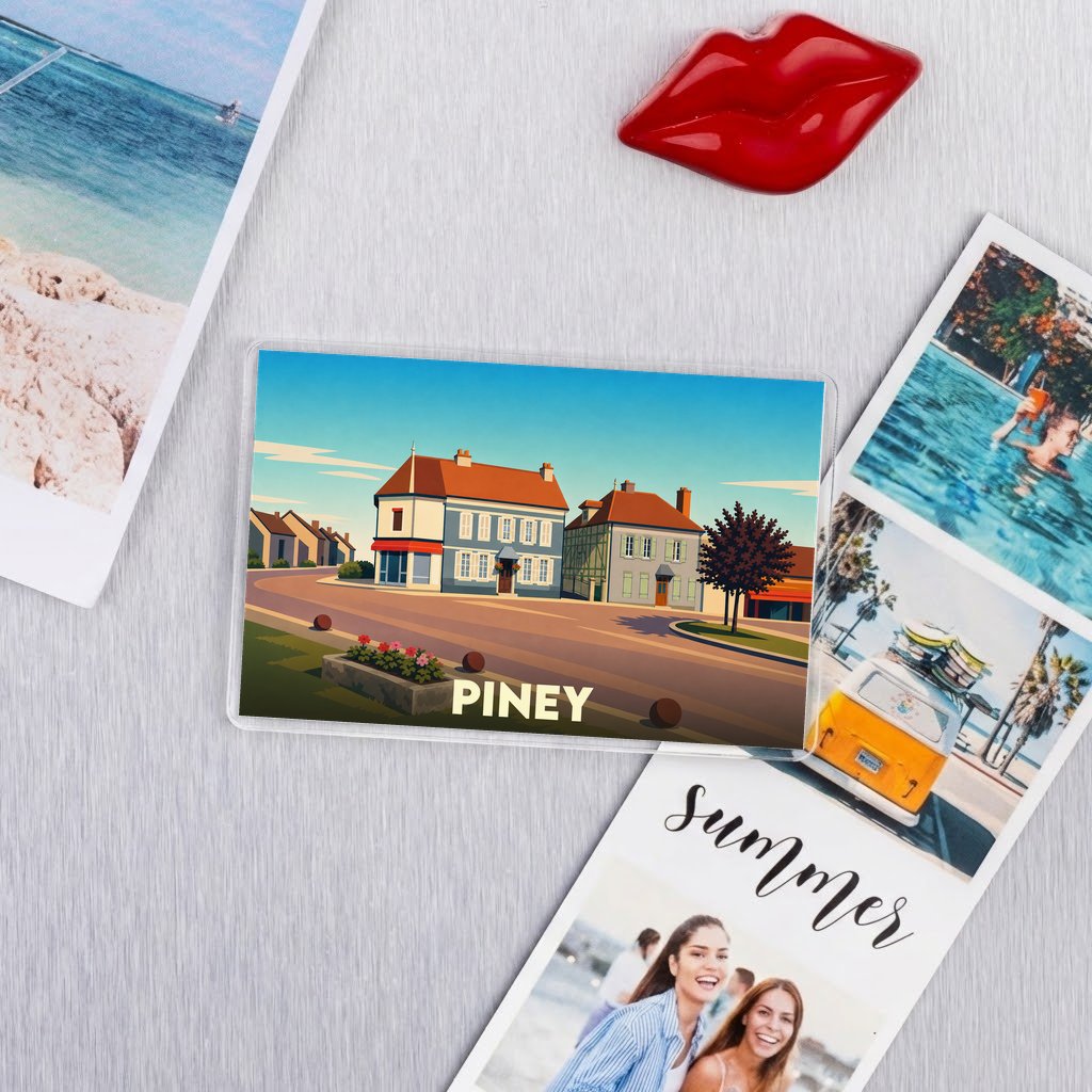 Magnet souvenir de la ville de Piney avec une illustration stylisée.