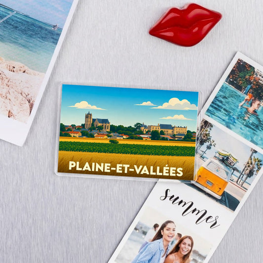 Magnet souvenir de la ville de Plaine-et-Vallées avec une illustration stylisée.