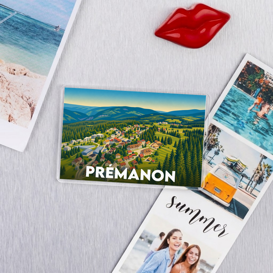 Magnet souvenir de la ville de Prémanon avec une illustration stylisée de son paysage montagnard.