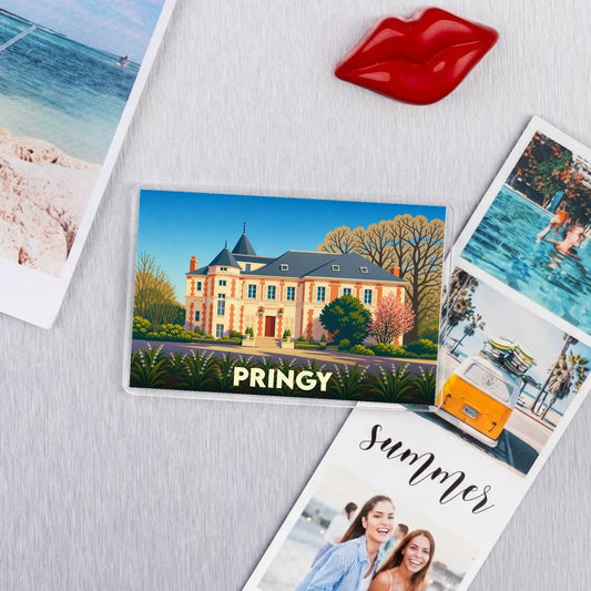 Magnet souvenir de la ville de Pringy avec une illustration stylisée d'un château.