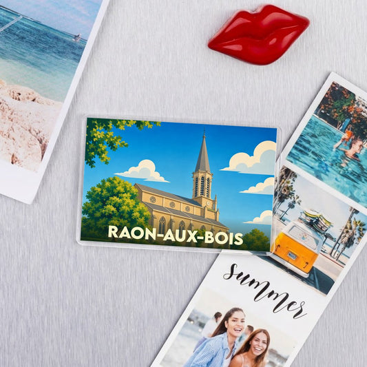 Magnet souvenir de la ville de Raon-aux-Bois avec une illustration stylisée de son église.