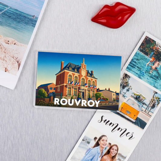 Magnet souvenir de la ville de Rouvroy avec une illustration stylisée de l'hôtel de ville.