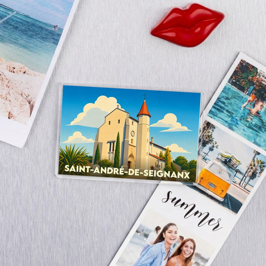 Magnet souvenir de la ville de Saint-André-de-Seignanx avec une illustration stylisée de son église.