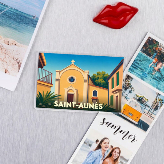 Magnet souvenir de la ville de Saint-Aunès avec une illustration stylisée de son église.