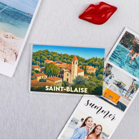 Magnet souvenir de la ville de Saint-Blaise avec une illustration stylisée.