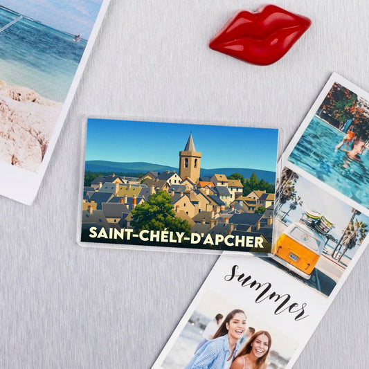 Magnet souvenir de la ville de Saint-Chély-d'Apcher avec une illustration stylisée.