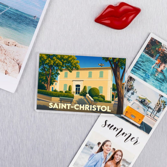 Magnet souvenir de la ville de Saint-Christol avec une illustration stylisée.