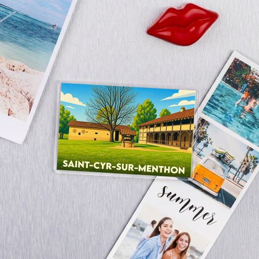 Magnet souvenir de la ville de Saint-Cyr-sur-Menthon avec une illustration stylisée d'un domaine traditionnel.