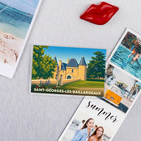 Magnet souvenir de la ville de Saint-Georges-lès-Baillargeaux avec une illustration stylisée d'un château.