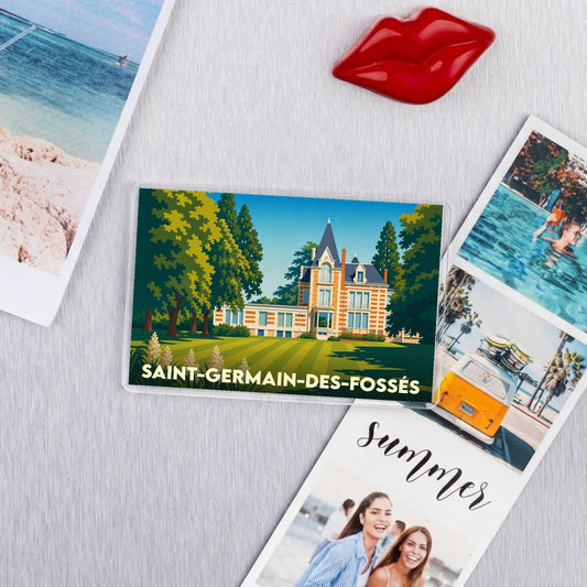 Magnet souvenir de la ville de Saint-Germain-des-Fossés avec une illustration stylisée d'un manoir.